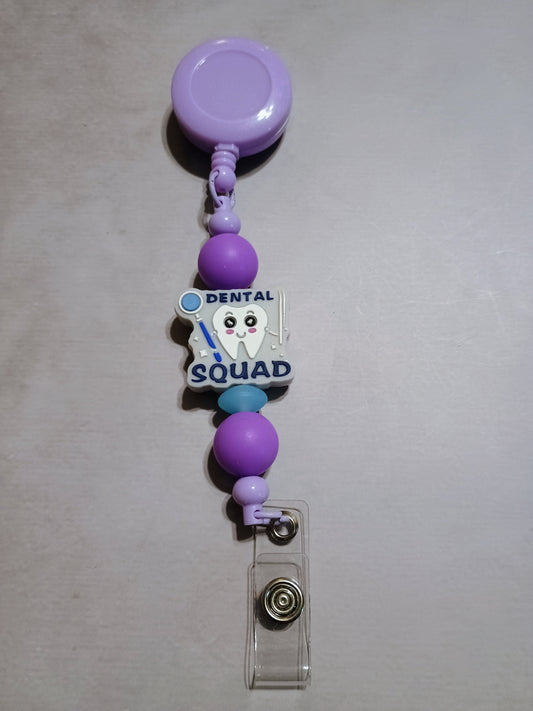 Retractable name badge clip