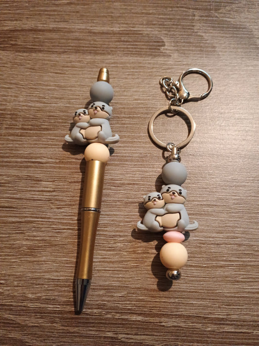 Otter pen and keychain bundle