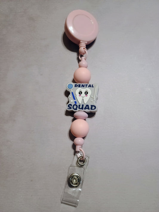 Retractable name badge clip